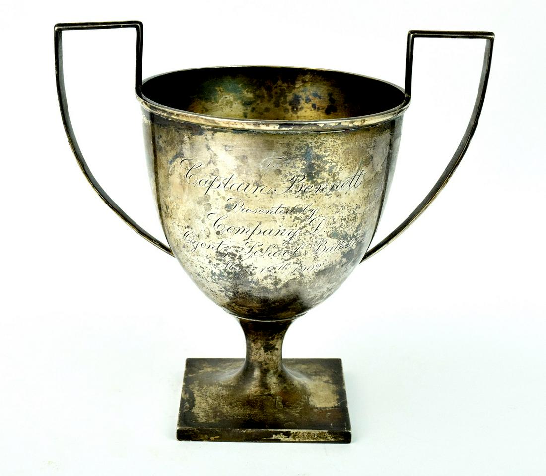 1902 Sterling Silver School Battle Trophy Cup Named: Antique 1902 sterling silver two handle " School Battle" two handle trophy cup presented to Captain Bennett who served in India. Comes with copy of the original photograph of the Captain with his trop