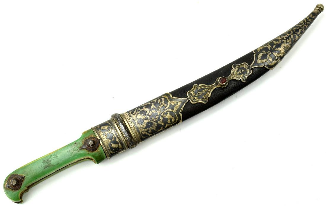 Very Rare 19th C. Russian Caucasian BEBUT Dagger with: Very Rare 19th C. Russian Caucasian BEBUT Dagger with Gold Inlaid Blade. A seldom encountered example of curved form, wearing a broad double edged blade with one off-set fuller to each side, front of