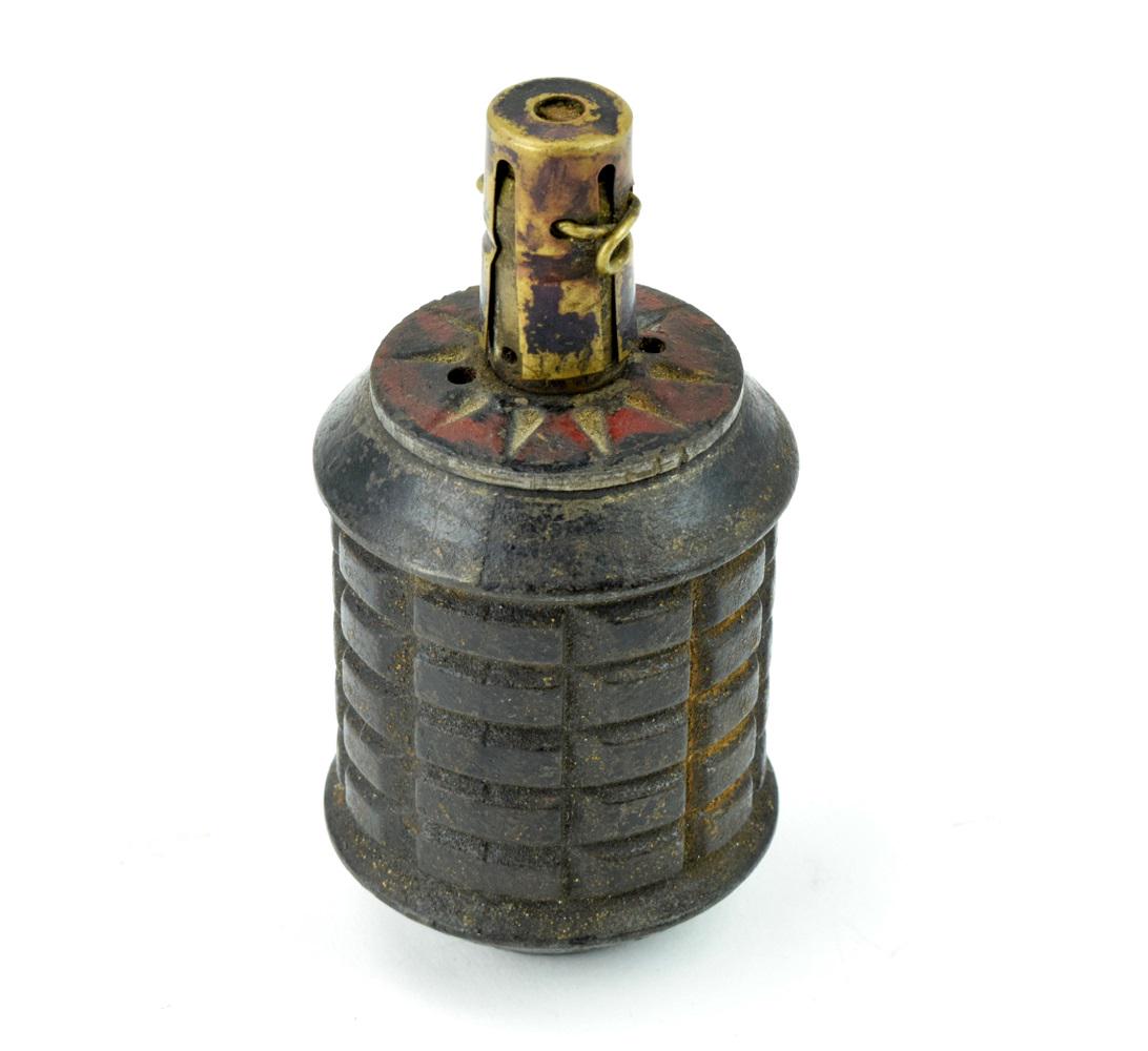 WWII Imperial Japanese M97 Type Grenade: WWII Imperial Japanese M97 Type Grenade. Standard-issue Japanese Type 97 hand grenade, 3 3/4" x 2" dia., used by the Imperial Japanese Army and the Special Naval Landing Forces with original sticker.