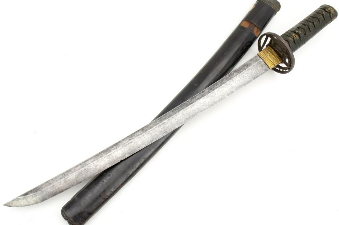 Early Japanese Samurai WAKIZASHI Sword ~ Long Signature: Early Japanese Samurai WAKIZASHI Sword ~ Long Signature ~ No KAMI YOSHIKANE. In its very early iron mounts, wearing a large and heavy blade featuring a lengthy smith signature on its tang, ...no Kami 