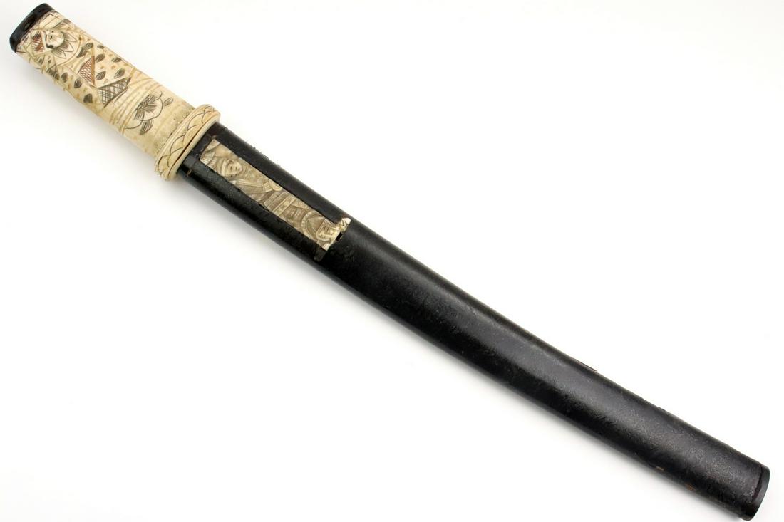 Unusual MeiJi era Japanese TANTO Dagger for European: Unusual MeiJi era Japanese TANTO Dagger for European Trade. With its carved ox-bone hilt and simulated Kozuka handle, bull horn Kashira. Housed in a very nicely lacquered wooden scabbard. Blade with h