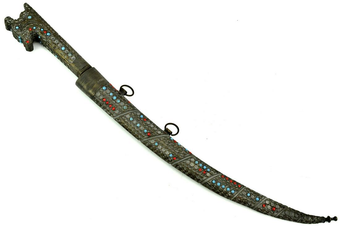 Attractive 19th C. Islamic Arabic Moroccan NIMCHA: Attractive 19th C. Islamic Arabic Moroccan NIMCHA Dagger with Turquoise & Coral Decorations. A very ornate example in its filigree brass mounts adorned with cabochon turquoise and red corals (some mis