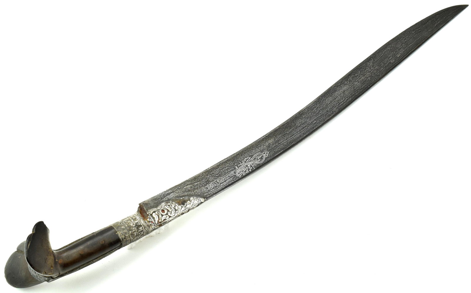 Very Good 1234 = 1818 Dated Islamic Turkish Damascus: Very Good 1234 = 1818 Dated Islamic Turkish Damascus YATAGAN Sword. An impressive early example, with its silver mounts and large horn grips of traditional eared form. Wearing a fine Damascus blade ha