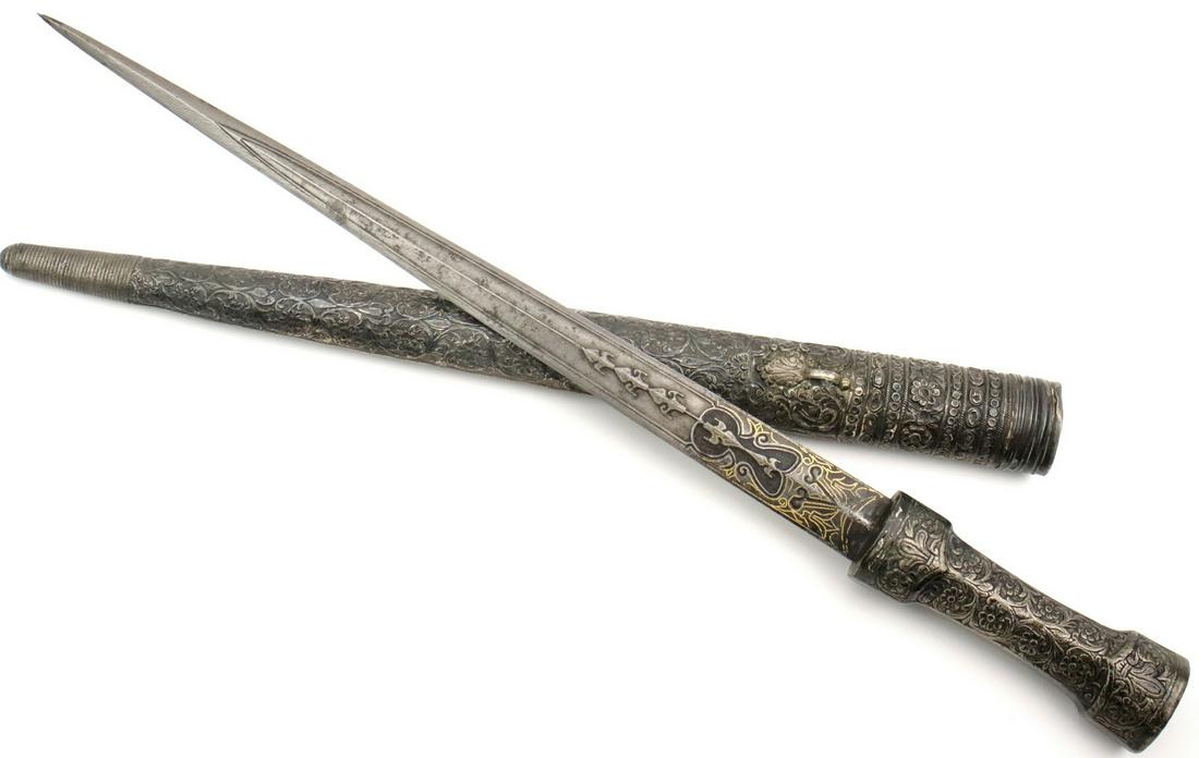 Rare 17th-18th C. Islamic Turkish Hancer Dagger with: Rare 17th-18th C. Islamic Turkish Hancer Dagger with Wootz Damascus Blade. In its silver furniture of typical form adorned with carved floral decorations. Mounted with a strong and sturdy double edged
