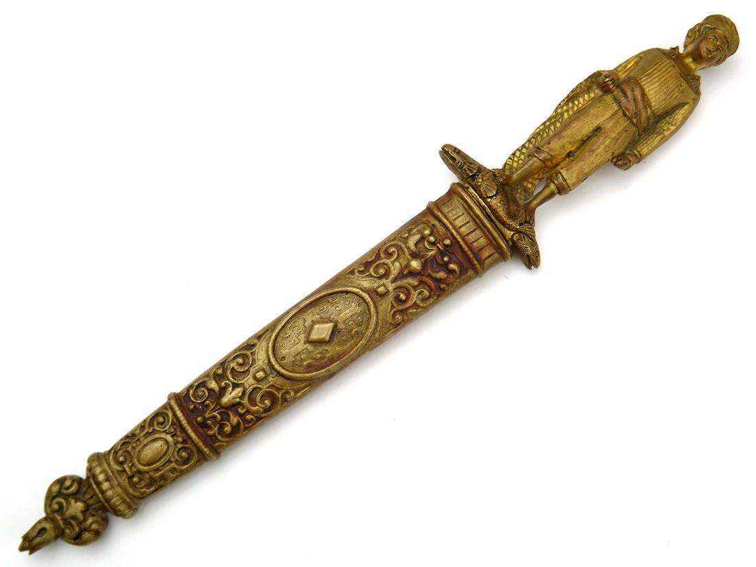 Lovely 1872 Spanish Toledo Romantic Figural Statue: Lovely 1872 Spanish Toledo Romantic Figural Statue Dagger with Gilt Bronze Mounts. A wonderful example with a well-marked and dated double-edged blade of diamond section. A detailed cast bronze hilt w