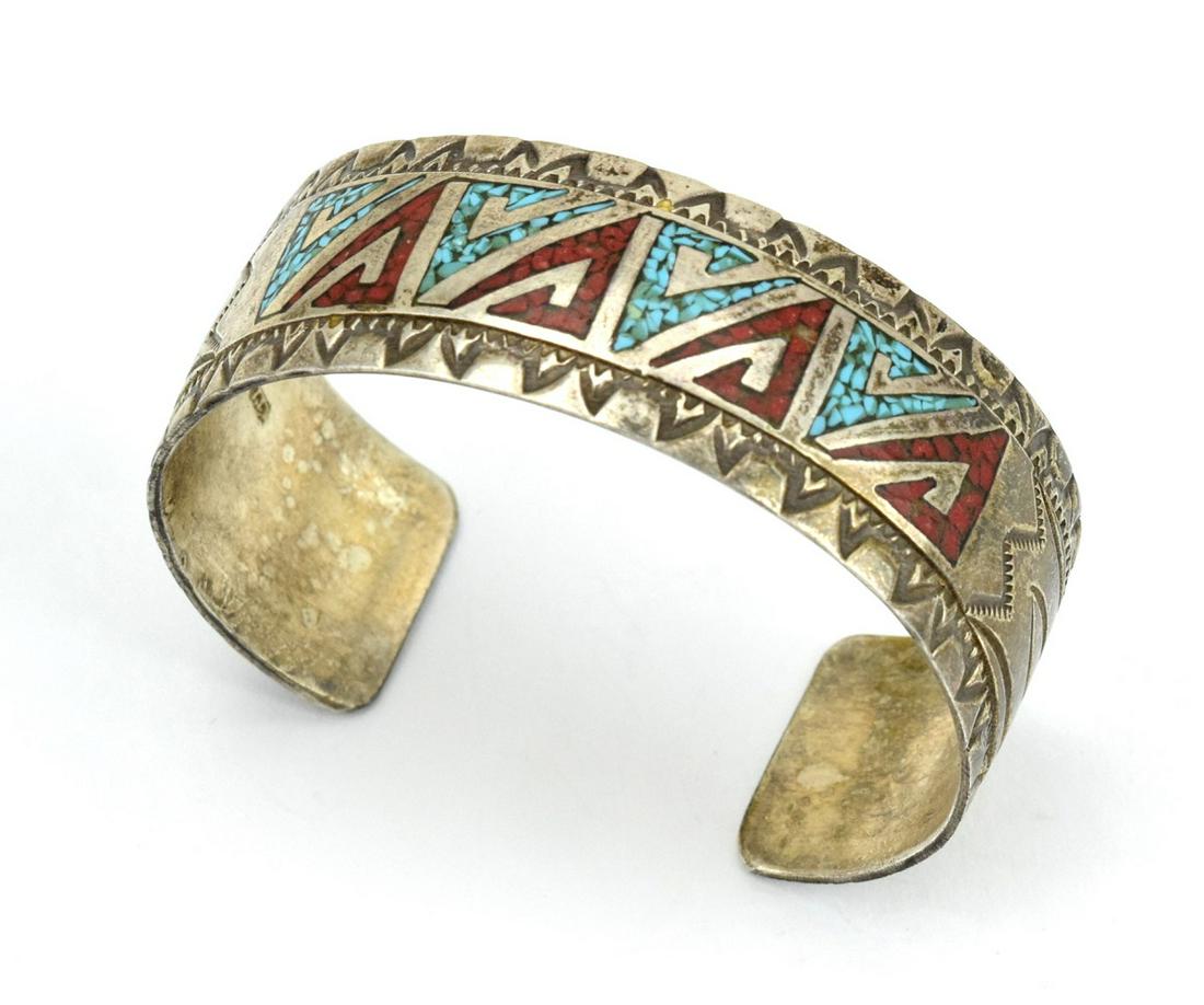 Vintage Native American Sterling Silver Turquoise: Vintage Native American Sterling Silver Turquoise Inlaid Cuff Bracelet by Navajo Silversmith Wilson And Carol Begay. Lovely piece.Marked: Sterling W.C.B.Total Weight: 27.9 grams.15 cm long with 3 cm g