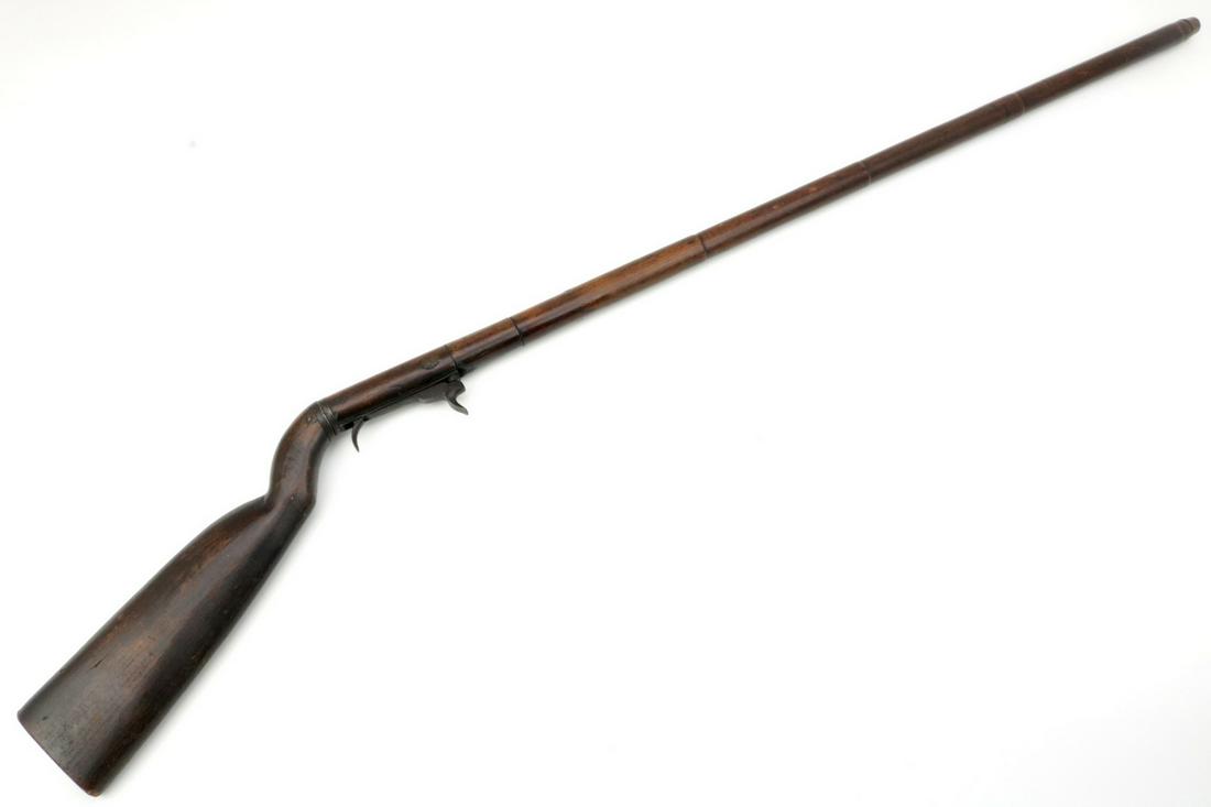 Rare 19th C. European or American Percussion Gun -: Rare 19th C. European or American Percussion Gun - Walking Cane with Full Wood Stock. Total length (inside scabbard if present) : 44 1/4". Detailed condition reports are not included in this catalog.