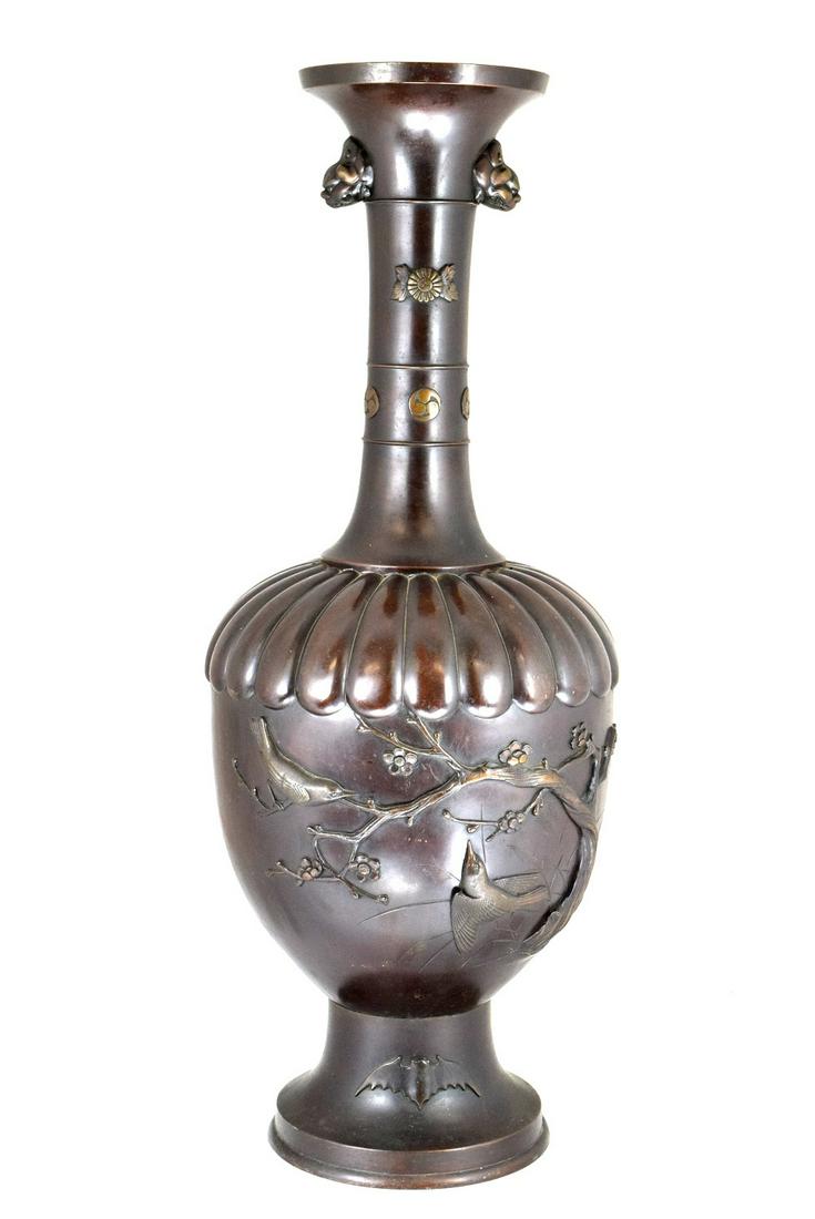 Exclusive Meiji Period Japanese Mixed Metal Bronze Vase: A large and heavy patinated Japanese bronze & mixed metal vase, Meiji Period (1868-1912).Finely proportioned patinated bronze & mixed metal vase, the ovoid body decorated with raised motifs of flying 