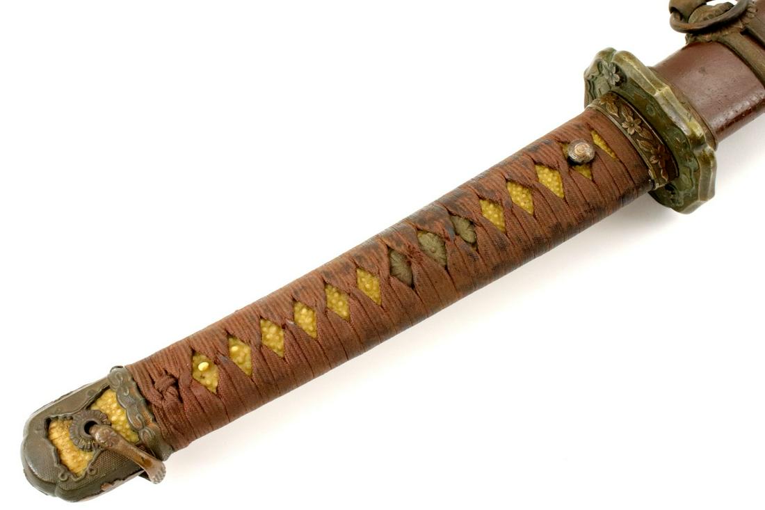 Double-Signed WW II Japanese Army Officer's Katana: Double-Signed WW II Japanese Army Officer's Katana Sword ~ Lengthy Signature and Date on the Tang.Total Length (inside scabbard if present) : 39 1/4" Blade Length (Nagasa) : 26 1/2" ~~~~~ LIVEAUCTIONE