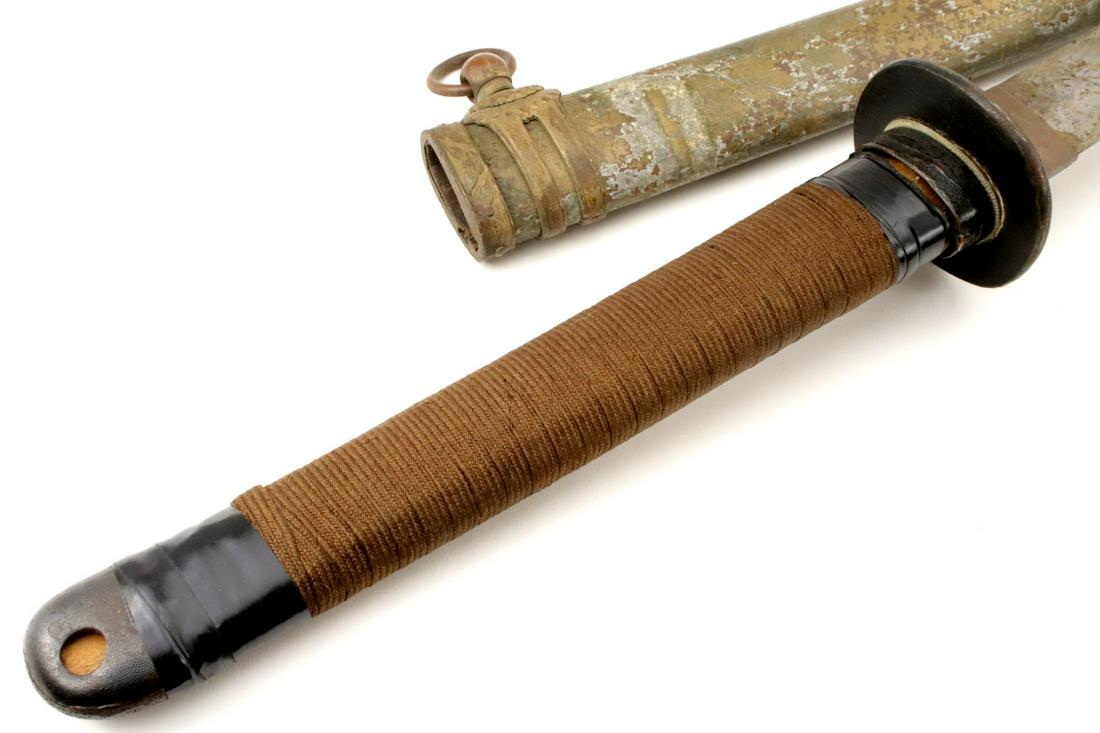 Double-Signed WW II Japanese Landing Forces Katana: Double-Signed WW II Japanese Landing Forces Katana Sword ~ Scabbard with Bullet Shut. Total Length (inside scabbard if present) : Blade Length (Nagasa) : 26" ~~~~~ LIVEAUCTIONEERS.COM BIDDERS, PLEASE 