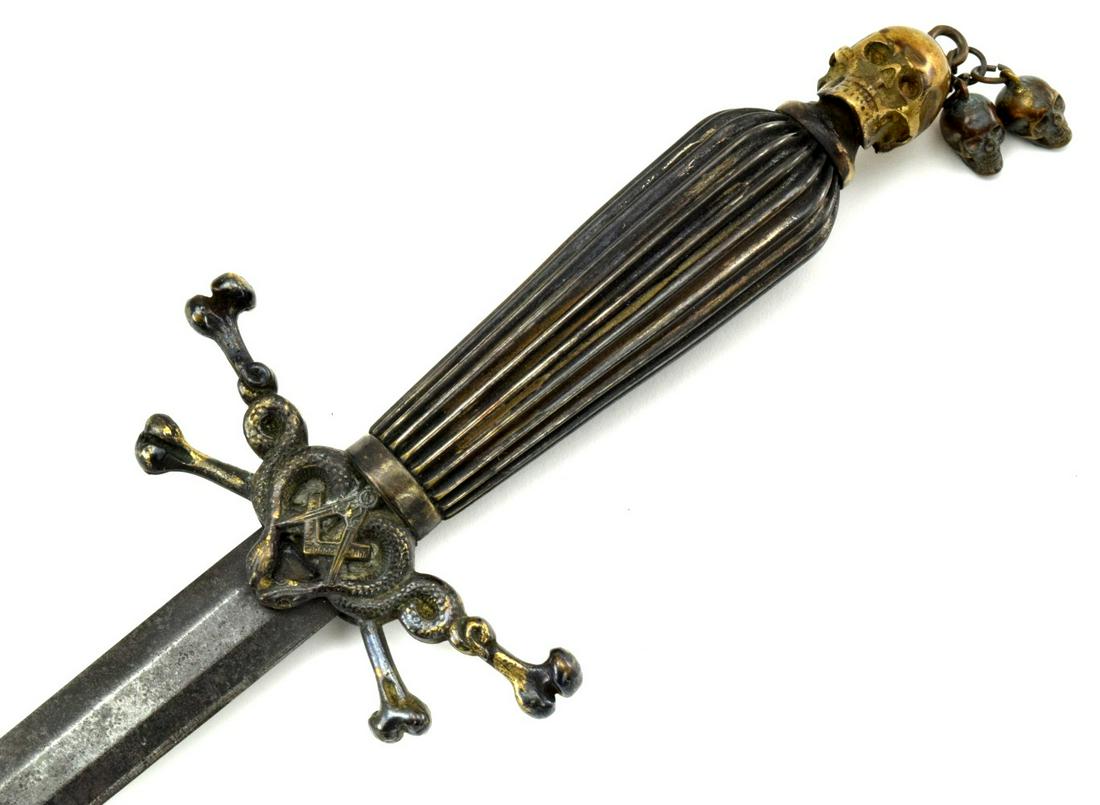 Rare 19th C. Masonic Dagger Dirk with Skull & Bones: Rare 19th C. Masonic Dagger Dirk with Skull & Bones Pommel ~ Silvered Grip ~ American or German. Total Length (inside scabbard if present) : 16" Blade Length : 10" Detailed condition reports are not i