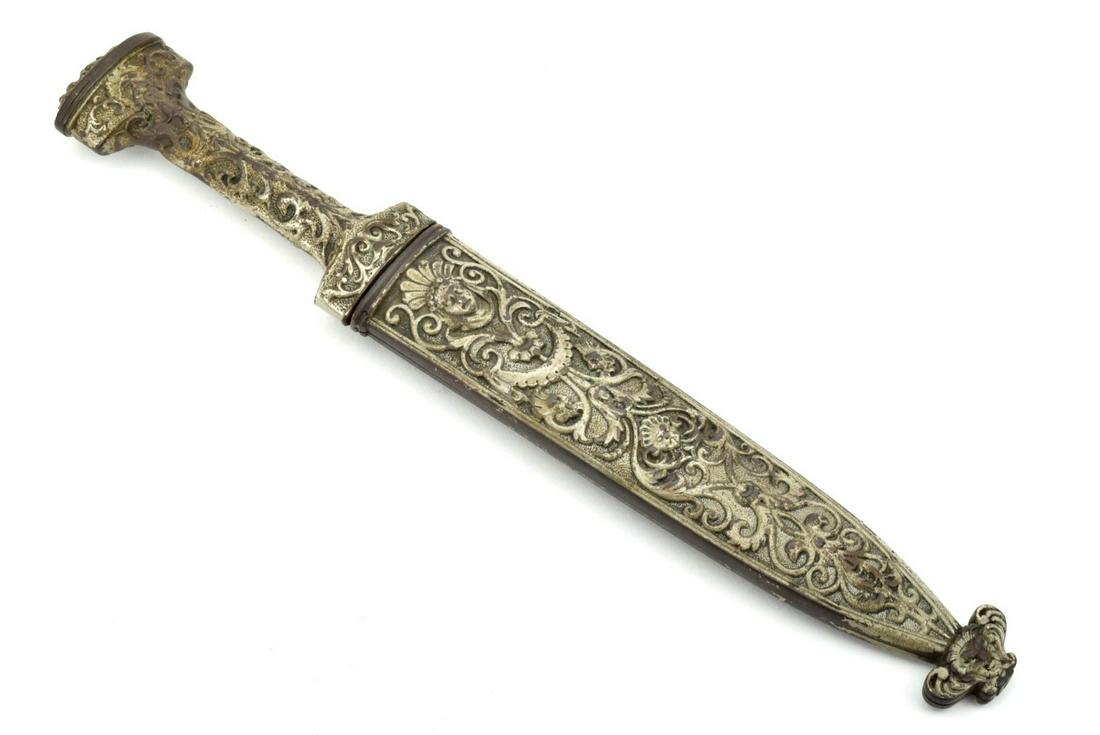Good 19th C. Spanish or French Romantic Dagger with: Good 19th C. Spanish or French Romantic Dagger with Ornate Silvered Iron Mounts & Strong Fighting Blade.Total Length (inside scabbard if present) : 11 1/2"Blade Length : 6 1/4"Detailed condition repor