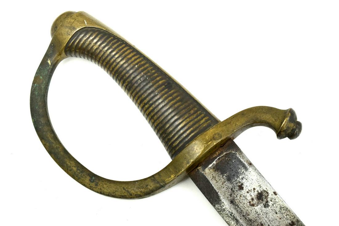 French 19th C. Infantry Briquet Sword with Unusual: French 19th C. Infantry Briquet Sword with Unusual Blade. Blade having seldom encountered raised false edge and is well inscribed on the spine. Rare early example. Total Length (inside scabbard if pre