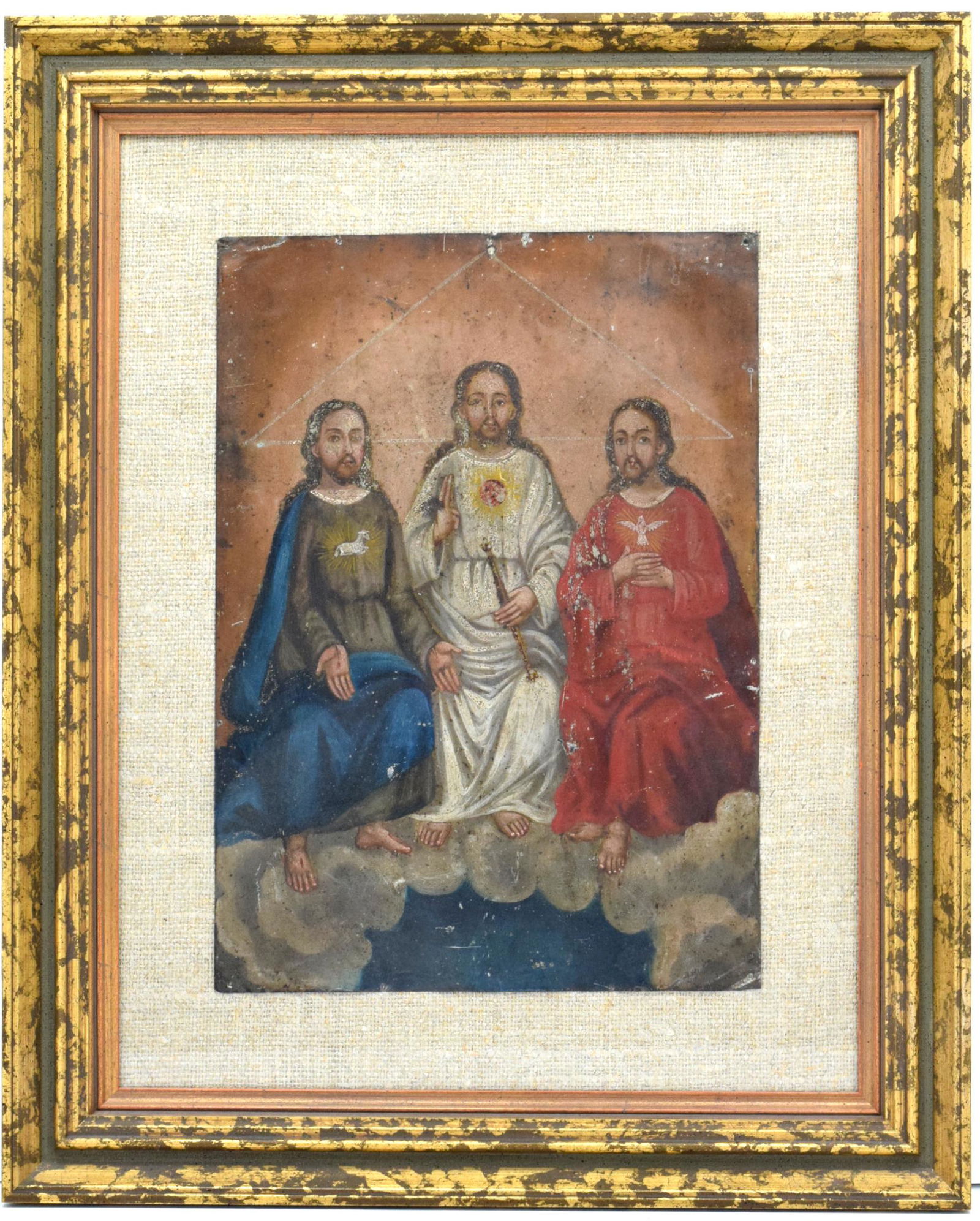 LARGE ANTIQUE TIN RETABLO ON TIN THE HOLY TRINITY: Latin America, Mexico, ca. 19th century CE. An antique Mexican retablo depicting the Holy Trinity, beautifully painted in vibrant jewel tone hues to enhance the majesty of the subject. God the Father