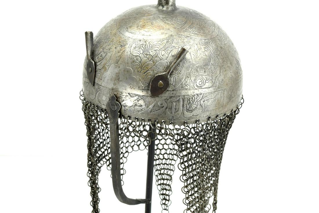 Islamic Indian or Persian Qajar Dynasty KHULA-KHUD: Islamic Indian or Persian Qajar Dynasty KHULA-KHUD Helmet. All steel with etched decorations and islamic scripts, original chain-mail still present. Sirca 19th - early 20th century. Total Length (insi