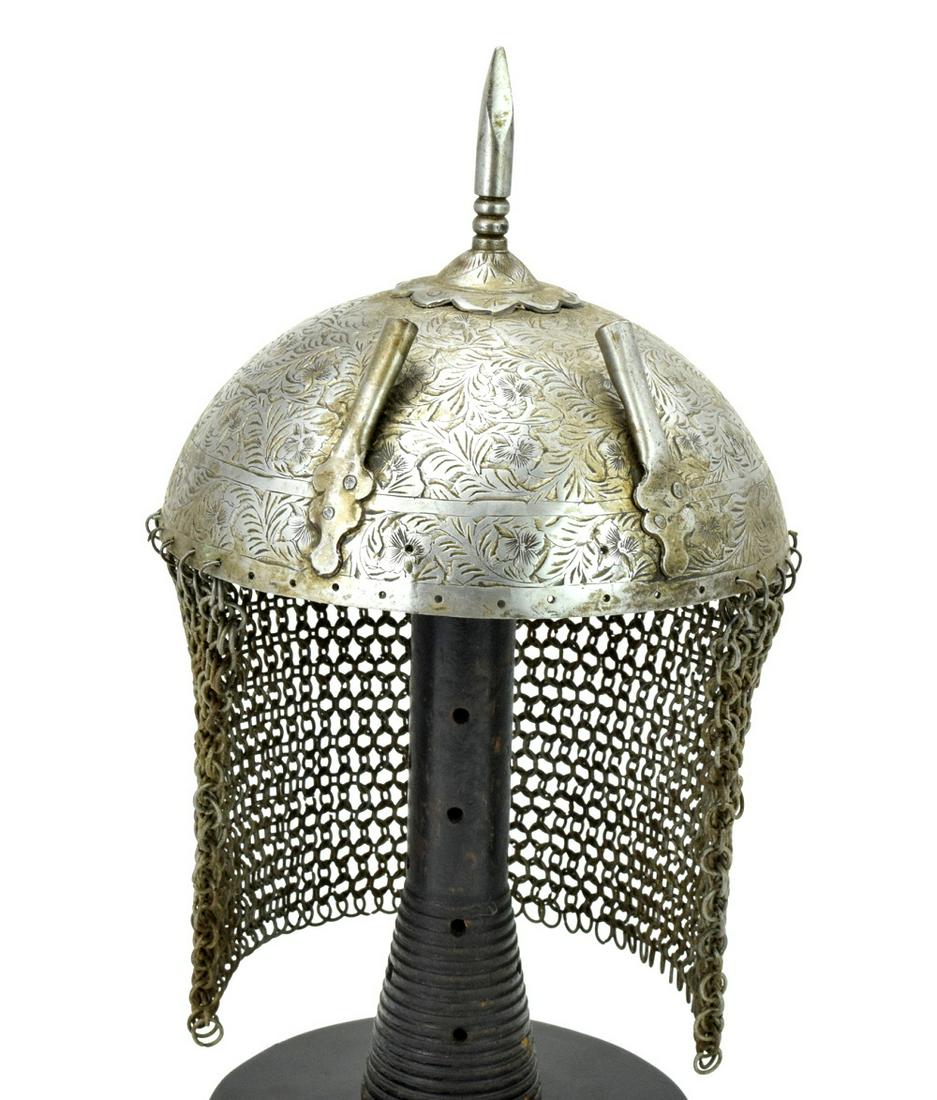 Indian or Persian 19th C. Parade Armor Helmet: Indian or Persian 19th C. Parade Armor Helmet KHULA-KHUD with Chain Mail. Wrought of good strong steel with feather holders and a strong top spike. The bowl with chased decorations of floral nature. W