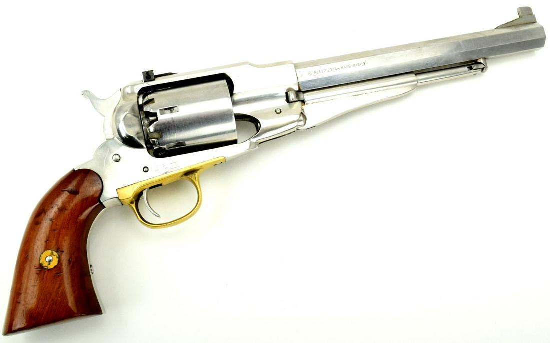 Italian replica of a Remington 1858 Army revolver: Italian replica of a Remington 1858 Army revolver. Finished in stainless steel, featuring walnut grips, target front and rear.Total Length : 14 3/4" Detailed condition reports are not included in this