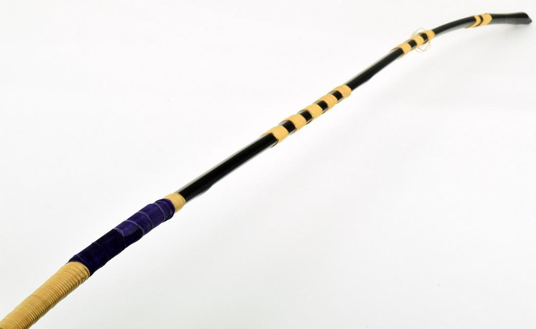 Antique Japanese Samurai YUMI Bow: A Japanese yumi bow wooden bow entirely lacquered in decorated with bamboo bands. Length : 87". Detailed condition reports are not included in this catalog. For additional information, including condi