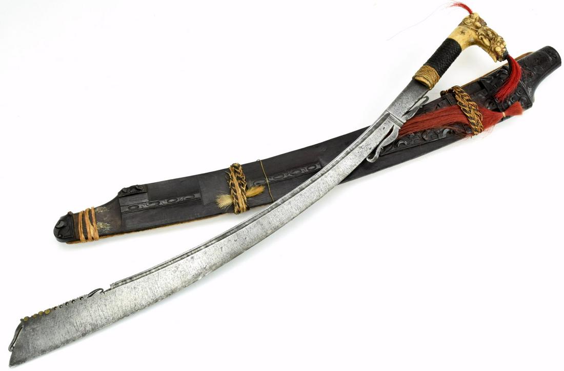 Very Good 19th C. Indonesian PARANG JIMPUL Sword ~: A distinctive Bornean sword of the Sea Dayak, called a Parang Jimpul, this swordis similar in style to the classic Iban Dayak Mandau and is the traditional weapon of the SeaDayak and Kenyah people fro