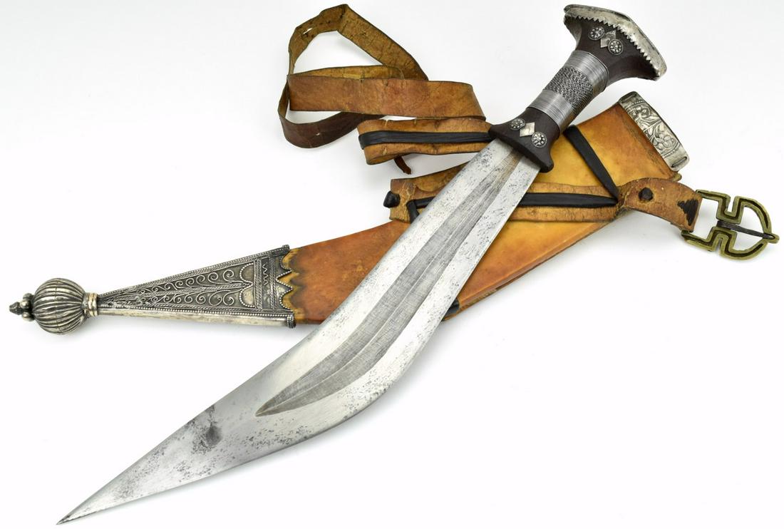 Very Good Silver Mounted Ethiopian (Horn of Africa): A classic form of Horn of Africa dagger called a gile, similar in form and derived from theArabian peninsular jambiya, the gile can be found in Ethiopia, Eritrea, Djibouti, and Somalia,where is known 