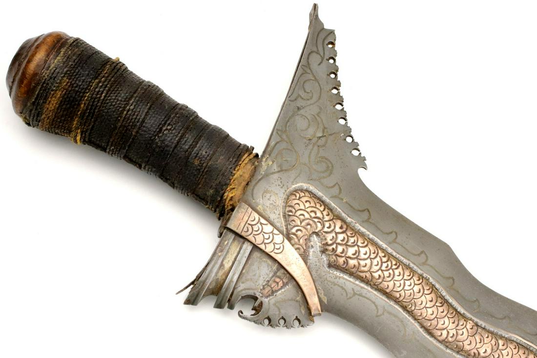 Rare 19th C. Philippine Naga Sulu Moro KRIS Sword ~: This is a classic sword of the Moro people of the southern Philippines and of the Sulu Sea areacalled a kris. The classic Moro kris is based heavily on the Indonesian keris but is distinctlylarger and