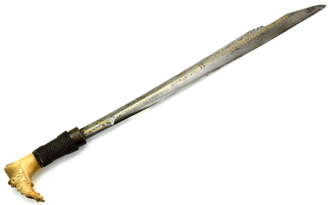 Rare 19th-early 20th C. MANDAU Parang Ihlang Sword ~: A distinctive Bornean sword of the Iban Dayak, called a mandau, these swords arefound throughout institutional and private collections in varying degrees of quality. They aredistinguished by a set of 
