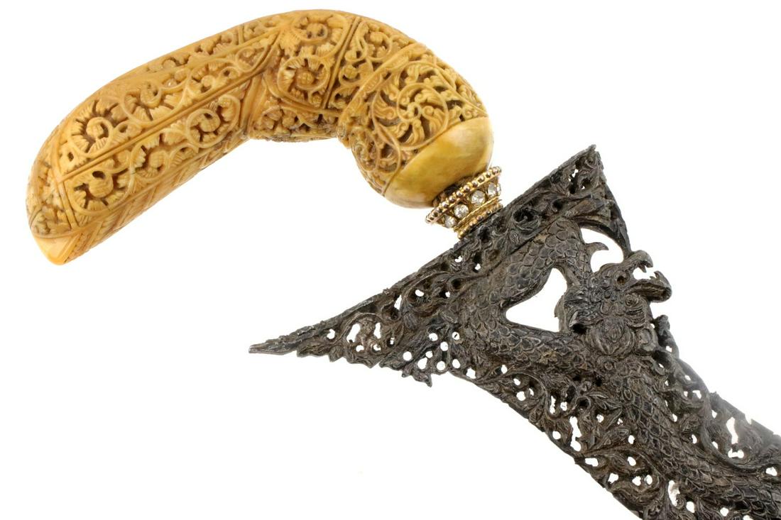 Exquisite Indonesian Bugis, Sulawesi KERIS Dagger ~: Keris from the Bugis people in South Sulawesi display a distinct form of hilt called a kerdas set an angle, and often heavily carved with scrollwork and floral designs. These hilts would be made of va