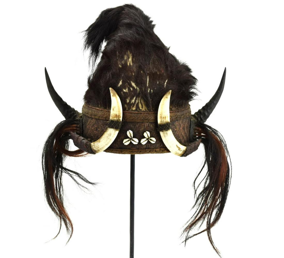 Rare 19th-20th C. Konyak Naga Headhunter: This helmet comes from the Naga Konyak tribe residing in the far east of India, onboth sides of the border to Myanmar (in the states of Nagaland, Assam, Manipur in India and inthe Sagaing division of 