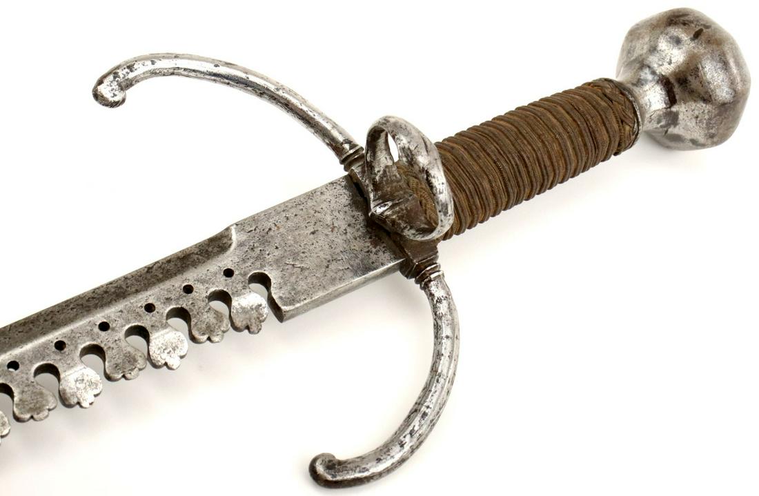 Rare Large 16th-17th C. Left Hand Dagger with Finely: Rare Large 16th-17th C. Left Hand Dagger with Finely Worked and Pierced Sword Catcher Spine ~ French, German or Italian. Total Length (inside scabbard if present) : 18.25". Blade Length : 13.25". ~~~~