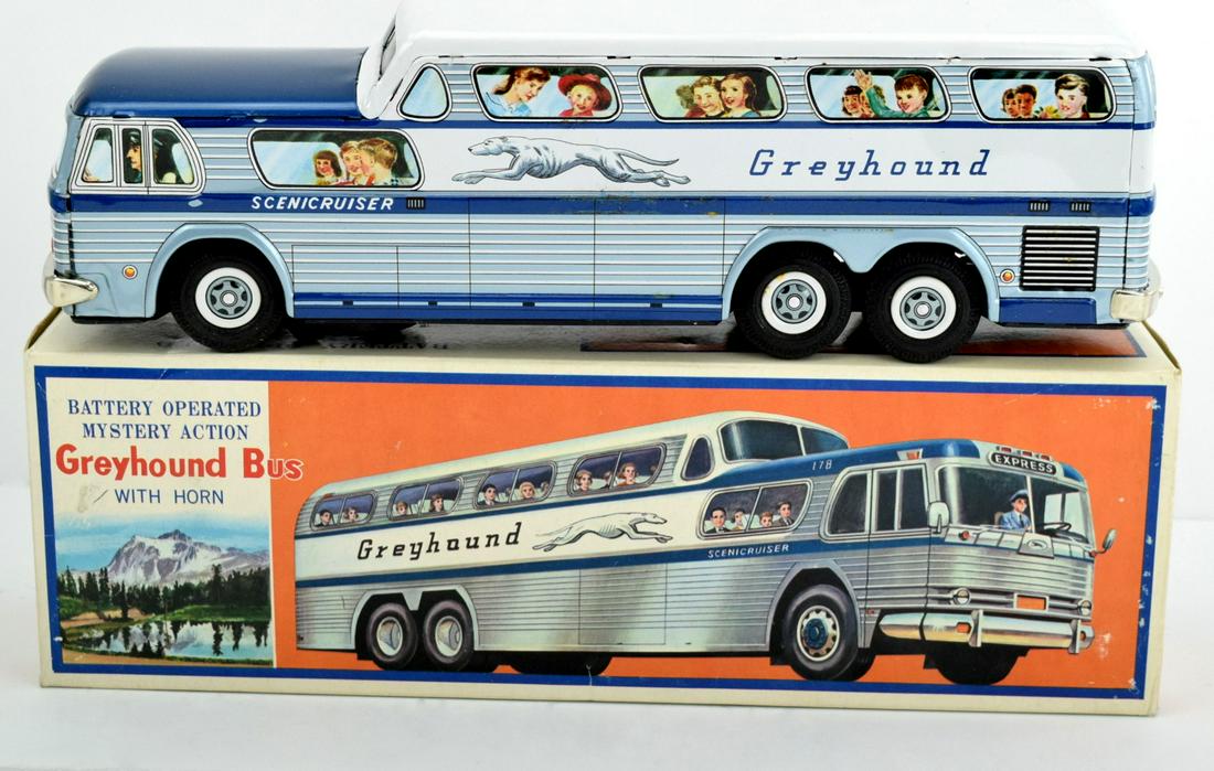 LARGE 14" GREYHOUND BUS W/HORN-MINT IN BOX-JAPAN: Large Greyhound Bus made in Japan by Daiya. Measures about 14" long. It has the bump & go action and it makes a honking horn sound. The bus is in mint, un-played condition. Original box. Untested.