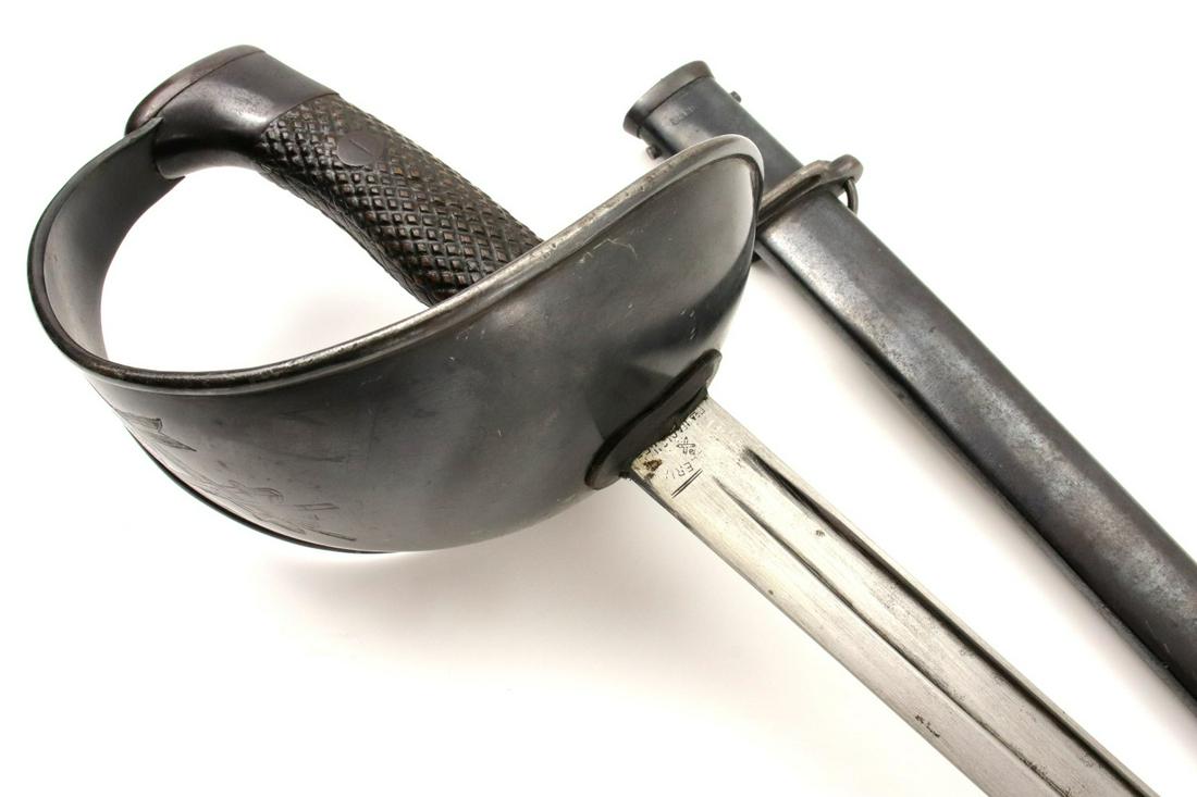 Large Spanish Cavalry Sword ~ Blade and Scabbard Marked: Large Spanish Cavalry Sword ~ Blade and Scabbard Marked TOLEDO ~ Beautiful Crowned Panoplie on the Guard. Total length (inside scabbard if present) : 43 1/4", Blade length :30 1/2". ~~~~~~ DEAR BIDDER