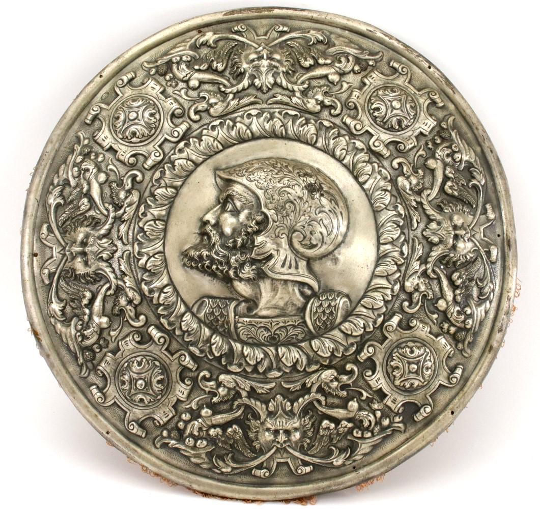 Beautiful Silvered Metal Shield of Renaissance era: Beautiful Silvered Metal Shield of Renaissance era Parade Armor Style ~ Fabulous Greek or Roman Warrior's Head in Helmet ~ Fine Mythological Motives with Demons & Bare Breasted Winged Creatures. Diame