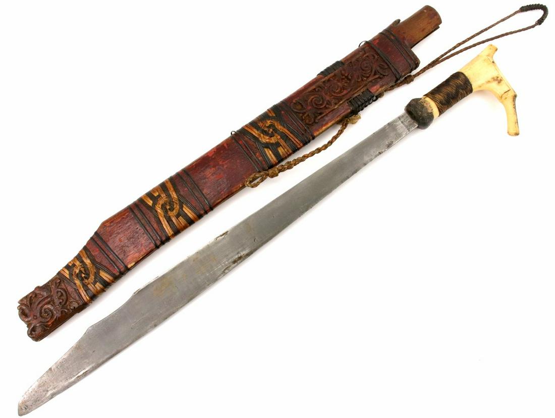 Antique Indonesian Tribal MANDAU Sword ~ Used by Borneo: Antique Indonesian Tribal MANDAU Sword ~ Used by Borneo DAYAK Tribe Headhunters ~ Bone Grip ~ Maker Marked Blade ~ Famous SCHMIEDT Collection. Total length (inside scabbard if present) : 25 1/4 ", Bla