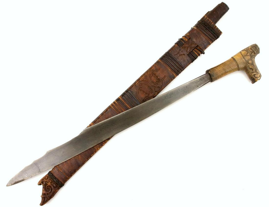 Antique Indonesian Tribal MANDAU Sword ~ Used by Borneo: Antique Indonesian Tribal MANDAU Sword ~ Used by Borneo DAYAK Tribe Headhunters ~ Famous SCHMIEDT Collection. Total length (inside scabbard if present) : 26 1/4 ", Blade length : 16 1/2"~~~~ DEAR BIDD