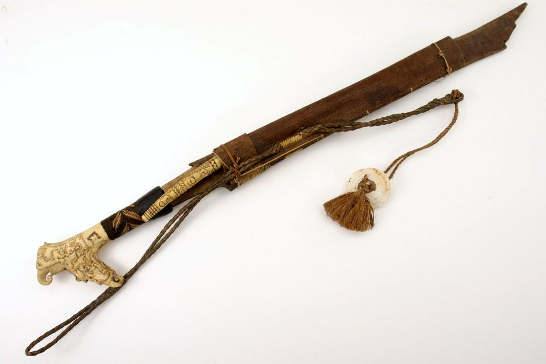 Antique Indonesian Tribal MANDAU Sword ~ Used by Borneo: Antique Indonesian Tribal MANDAU Sword ~ Used by Borneo DAYAK Tribe Headhunters ~ Fine Carved Bone Grip ~ With Original Side Knife ~ Famous SCHMIEDT Collection. Total length (inside scabbard if presen