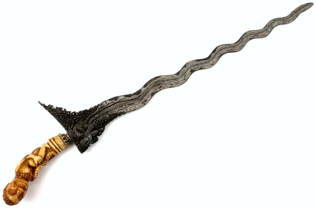 Rare Antique Indonesian KERIS Dagger with Fine Carved: Rare Antique Indonesian KERIS Dagger with Fine Carved Bone Grip & Exquisite Carved Damascus Steel Blade. Total length (inside scabbard if present) : 18 1/4", Blade length : 15 1/4". ~~~~~~ DEAR BIDDER