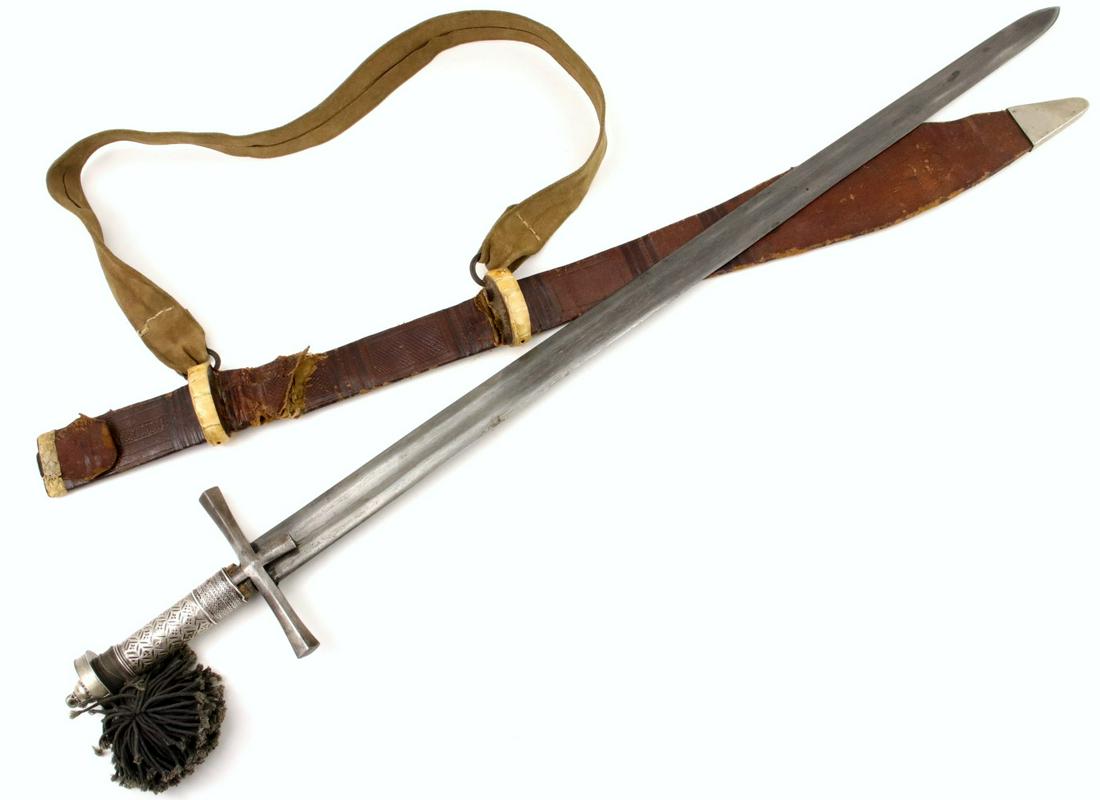 Large Antique Silver Mounted Sudanese KASKARA ~ African: Large Antique Silver Mounted Sudanese KASKARA ~ African Islamic Warrior's Broad Sword ~ Very Rare Layered Damascus Steel Blade. Total length (inside scabbard if present) :42 1/4 ", Blade length :33".