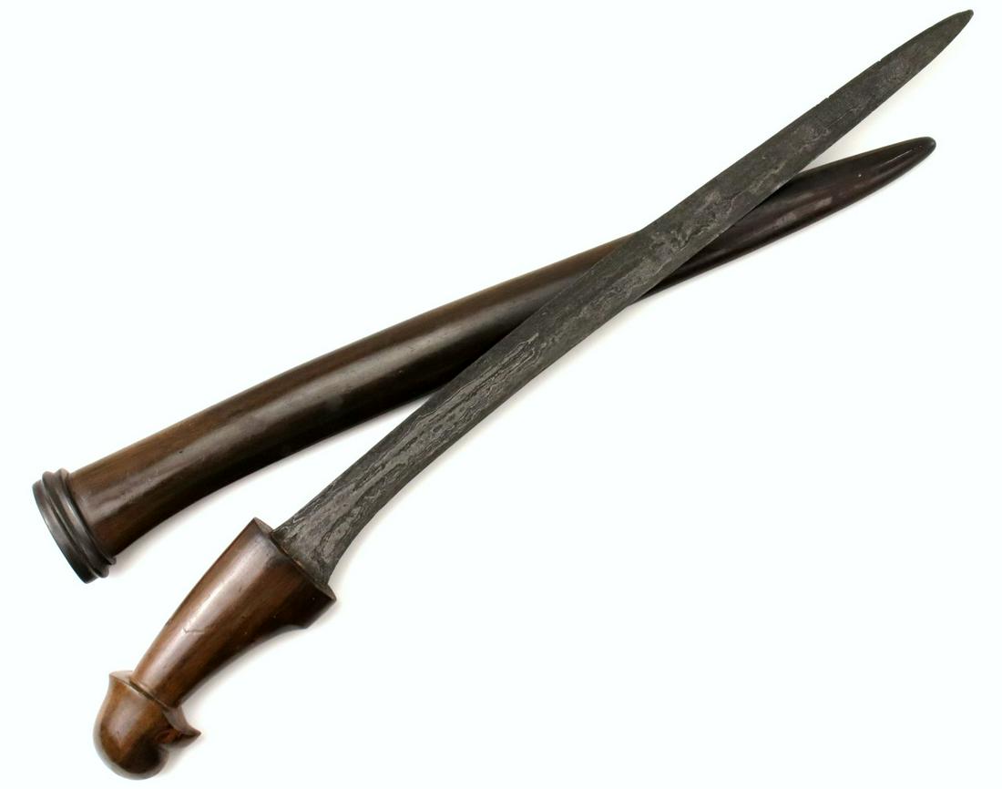 Unusual Antique Indonesian KERIS Dagger in Carved Wood: Unusual Antique Indonesian KERIS Dagger in Carved Wood Mounts ~ Damascus Steel Blade. Total length (inside scabbard if present) :23 ", Blade length : 16". ~~~~~~ DEAR BIDDERS, Please View More Detaile