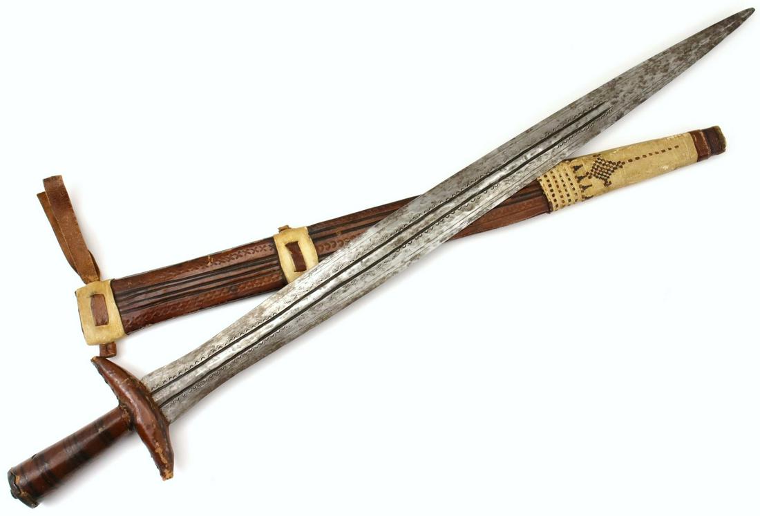 Unusual African Tribal Warrior's Sword or Large Dagger: Unusual African Tribal Warrior's Sword or Large Dagger ~ Probably TOUAREG Tribe. Total length (inside scabbard if present) : 26 1/4", Blade length : 21 1/2". ~~~~~~ DEAR BIDDERS, Please View More Deta