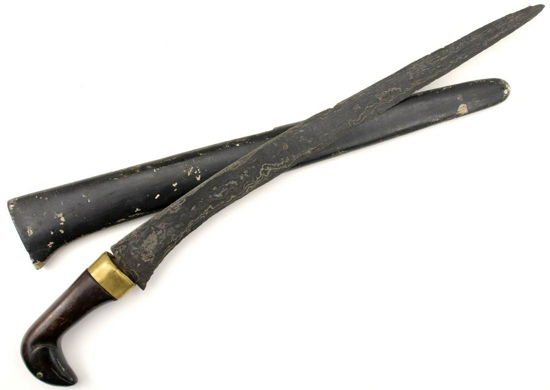 Unusual Antique Indonesian GOLOK Sword Dagger with: Unusual Antique Indonesian GOLOK Sword Dagger with Craved Wood Grip & Damascus Steel Blade. Total length (inside scabbard if present) :20 3/4 ", Blade length : 16 1/4". ~~~~~~ DEAR BIDDERS, Please Vie