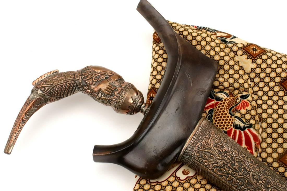 Good Antique Indonesian Sumatra KERIS Dagger ~ Silvered: Keris Dagger from Sumatra, Riau province, or Kelamantan area display a variety ofstylistic attributes. In this example, the hilt is formed in the style of a highly stylised Garuda.This hilt form may a