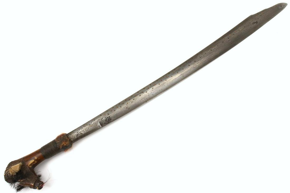 Antique Indonesian Tribal MANDAU Sword ~ Used by Borneo: Antique Indonesian Tribal MANDAU Sword ~ Used by Borneo DAYAK Tribe Headhunters ~ Carved Bone Grip. Total length (inside scabbard if present) : 24 1/4", Blade length : 19". ~~~~~~ DEAR BIDDERS, Please