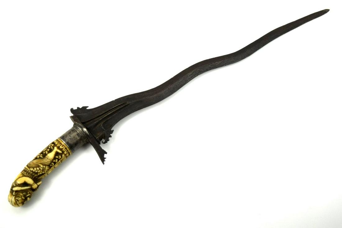 Good Antique Indonesian KERIS Dagger with Strong: Good Antique Indonesian KERIS Dagger with Strong Damascus Steel Blade & Fine Carved Grip. Total length (inside scabbard if present) : 20", Blade length : 15 1/2". ~~~~~~ DEAR BIDDERS, Please View More