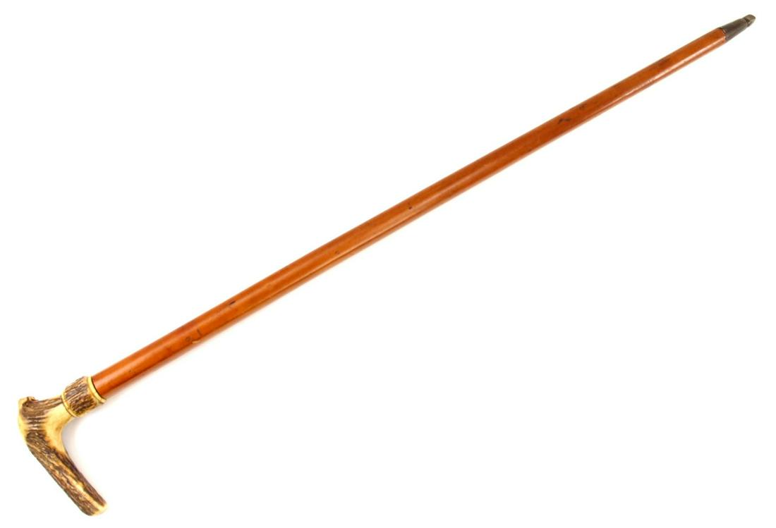 Very Good 18th-19th C. Sword Cane Walking Stick with: Very Good 18th-19th C. Sword Cane Walking Stick with Rapier Blade & Button-assisted Stag Grip. Total length (inside scabbard if present) : 34 7/8", Blade length : 28 3/4". ~~ DEAR BIDDERS, Please View