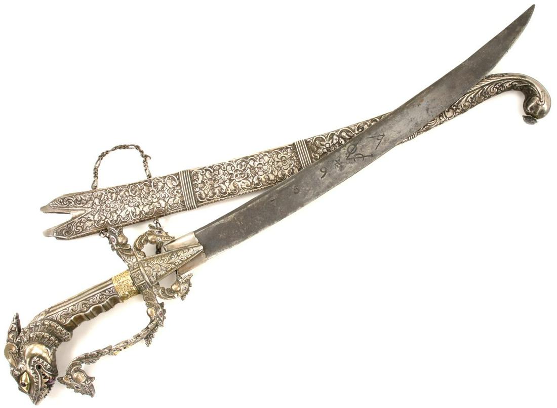 Very Fine 18th-19th C. Sri Lanka Ceylon KASTANE Sword: Very Fine 18th-19th C. Sri Lanka Ceylon KASTANE Sword in Ornate Silver, Gold & Ruby Mounts. A very fine example of a silver mounted Sri Lankan kastane sword. Kastane swords are distinctive in form and