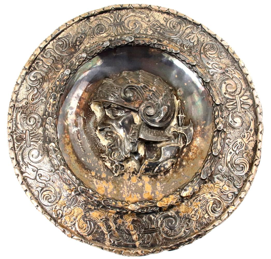 Large Antique Silver or Silver-plate Charger with: Large Antique Silver or Silver-plate Charger with Beautiful Embossed Knight Head with Helmet & Halberd. Diameter: 19 7/8". ~~ DEAR BIDDERS, Please View More Detailed Close-Up Images by visiting our we