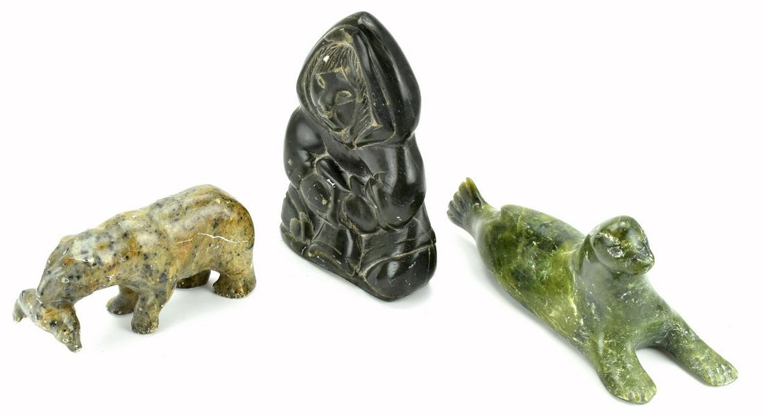 Lot 3 Vintage CanadaEskimo Art Inuit Soapstone: Nice lot of three Canada Native American Inuit art Eskimo soapstone carvings. One is carved figurine of Eskimo man ( signed and dated 1973 ) - 6,5" height. Second is polar bear with fish ( signed "Luk
