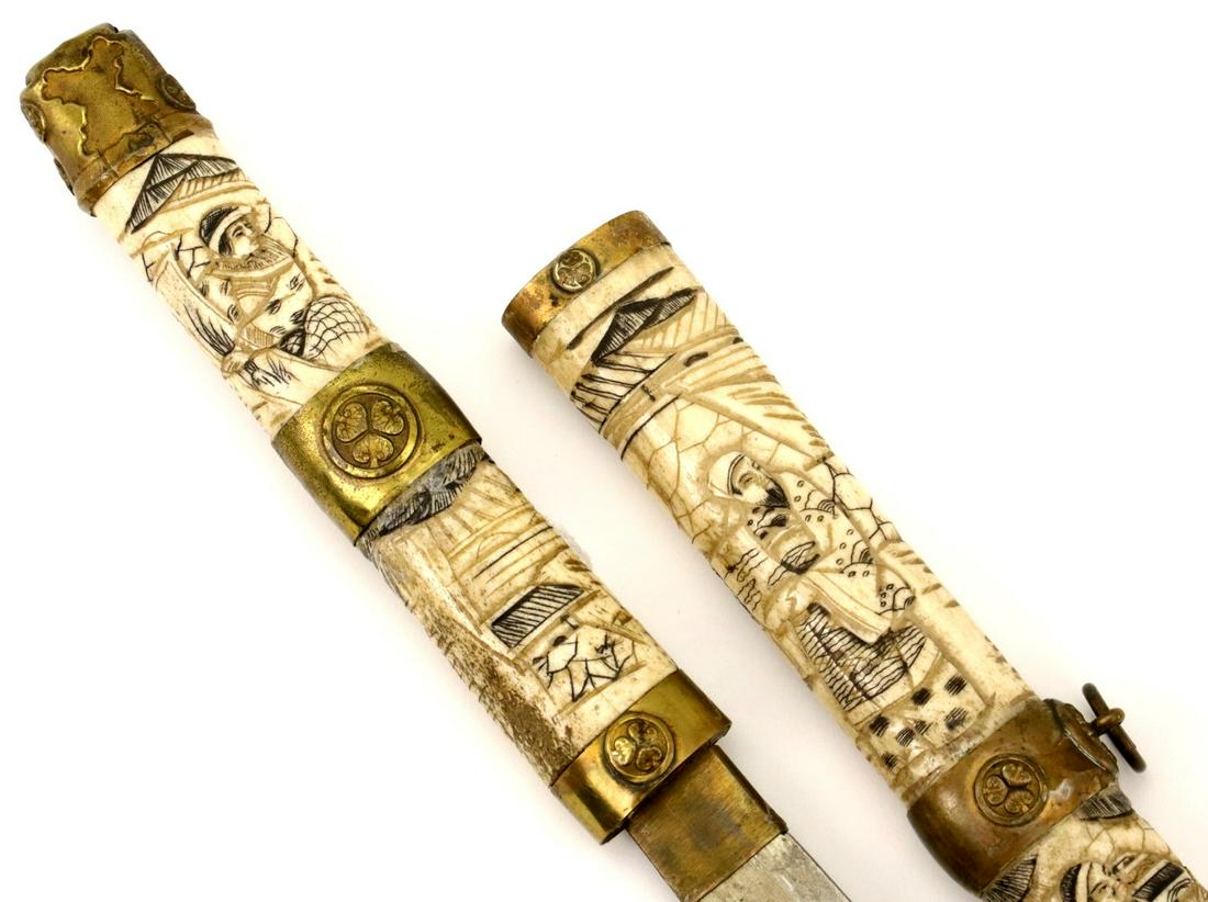 Nice MeiJi era Japanese Wakizashi Sword in Carved Ox: Nice MeiJi era Japanese Wakizashi Sword in Carved Ox Bone Mounts with Samurai Warriors & Officials ~ Gilt Brass Mounts with Family MON Symbols. Total length (inside scabbard if present) : 30", Blade l