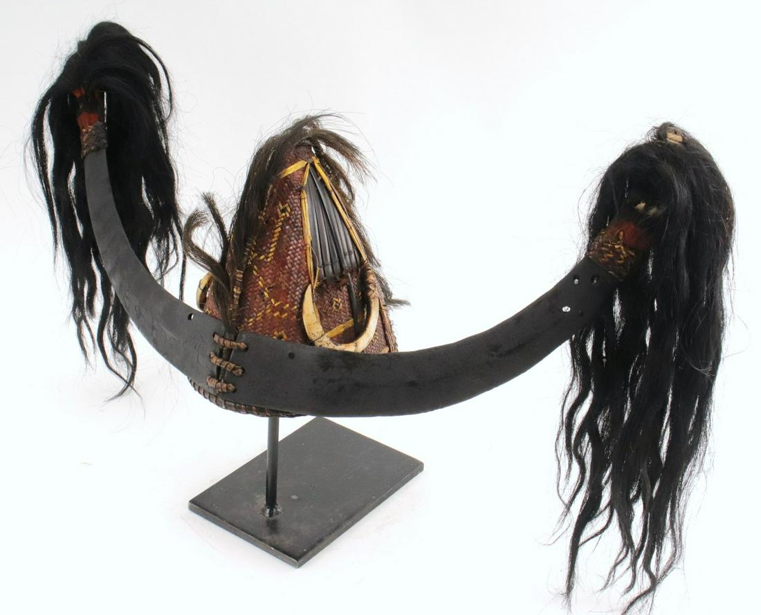 Rare 19th C. Indonesian Headhunters Dayak or Naga Tribe Warrior Hat Helmet with Boar Tusk: Rare 19th C. Indonesian Headhunters Dayak or Naga Tribe Warrior Hat Helmet with Boar Tusk Decorations. Helmet is 8" high,Tusks are 22" wide,(stand is not included in the sale).~~ DEAR BIDDERS, Please