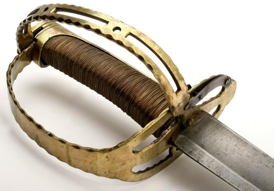 Scarce Late 18th C. French or Austrian Dragoon Sword with Collapsible Guard and Gilt Brass Mounts.: Scarce Late 18th C. French or Austrian Dragoon Sword with Collapsible Guard and Gilt Brass Mounts.Total Length (inside scabbard if present) : 35" Blade Length : 29 1/2".~ Detailed condition reports ar